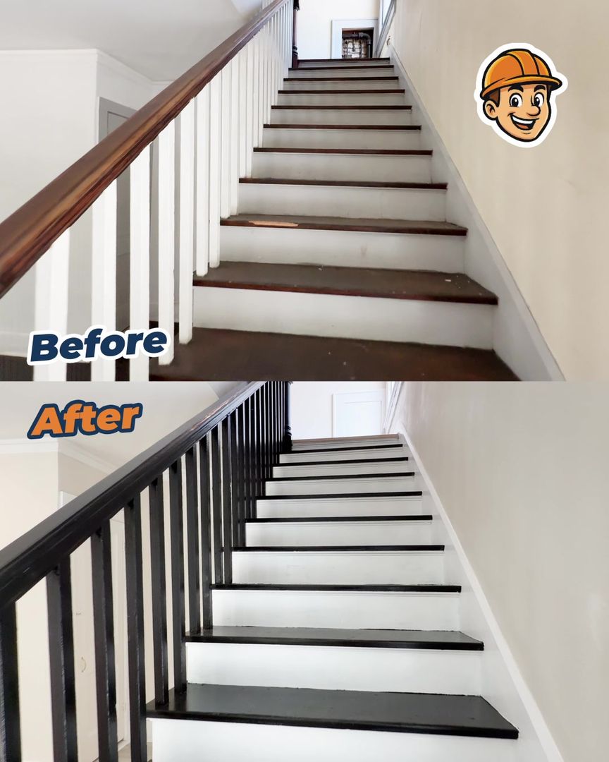 A refinished staircase with dark treads and black railings
